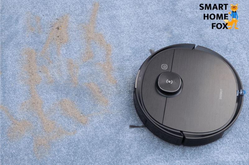 Deebot OZMO T8 AIVI in the sand suction test on a high-pile carpet